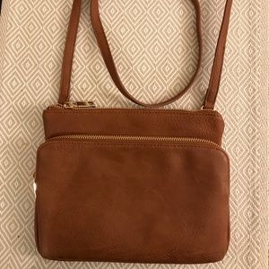 Faux leather bag. New condition. Never been used.
